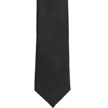 Load image into Gallery viewer, The front of a black herringbone tie, laid out flat