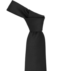 The knot on a black necktie