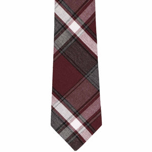 Front of a boys burgundy and gray plaid necktie