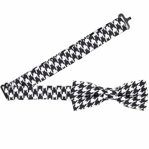 Open band collar on a boys' houndstooth bow tie