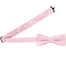 Load image into Gallery viewer, Open band on a pale pink paisley boys&#39; bow tie