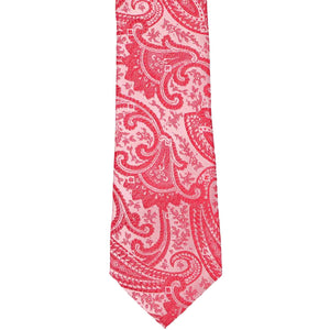 Front of a boys paisley red tie