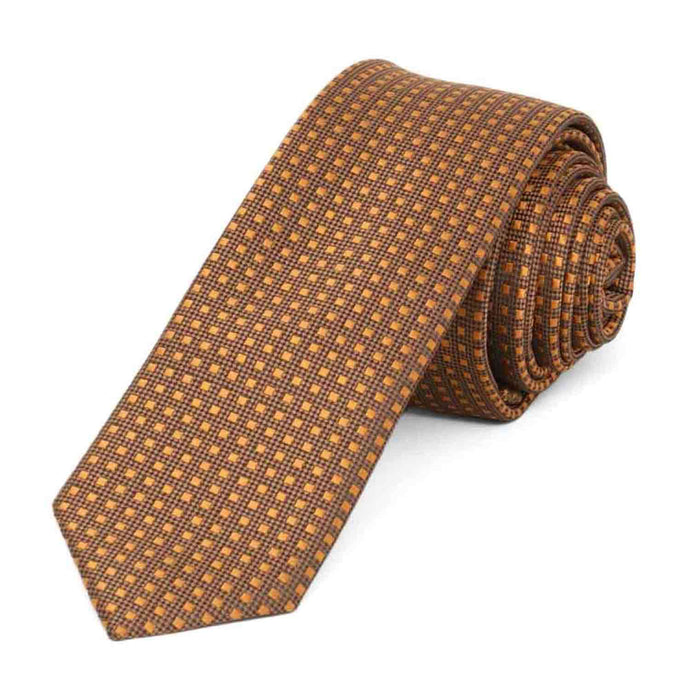 A light brown tie with a small square pattern