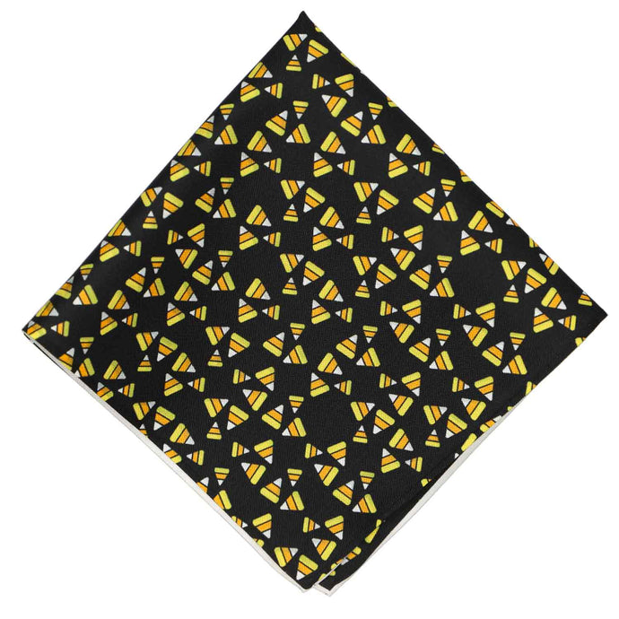 A candy corn themed pocket square in black, yellow, orange and white