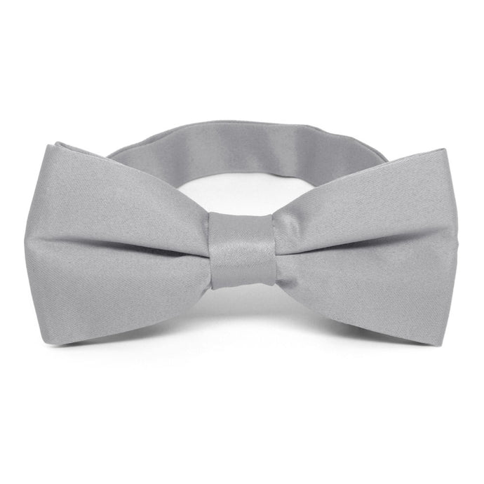 A silver bow tie, pre-tied with a band collar