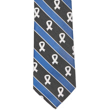 Load image into Gallery viewer, The front of a colon cancer awareness striped tie with ribbons