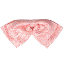 Load image into Gallery viewer, Front view of a coral paisley floppy bow tie