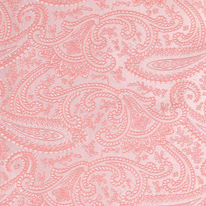 Closeup of a coral paisley pattern