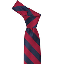 Load image into Gallery viewer, The knot on a crimson red and navy blue striped tie