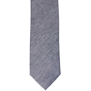 The front of a dark blue linen narrow tie