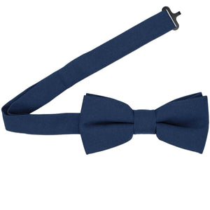 Open band collar on a dark blue matte bow tie