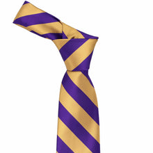 Load image into Gallery viewer, Knot on a dark purple and honey gold striped tie