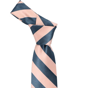 Knot on a dusty blue and petal striped necktie