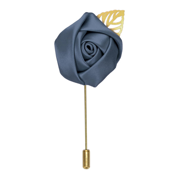 Lapel pin with a dusty blue flower and gold tone leaf and pin