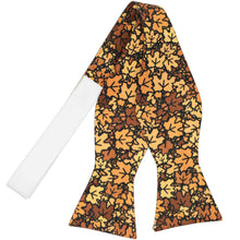 Load image into Gallery viewer, A fall leaves themed self-tie bow tie, untied