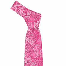 Load image into Gallery viewer, Tied knot on a fuchsia paisley necktie