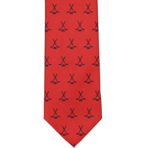 Front view red hockey stick and puck pattern necktie