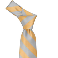 Load image into Gallery viewer, Knot on a honey gold and silver striped tie