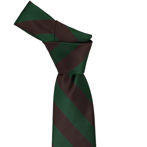 Knot on a hunter green and brown striped tie