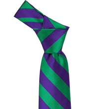 Load image into Gallery viewer, Knot on a kelly green and dark purple striped tie knot