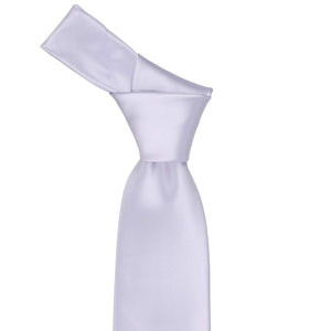 Knot on a lilac solid tie