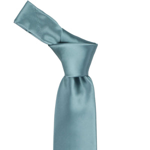 Knot on a mystic blue tie