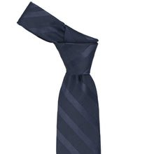 Load image into Gallery viewer, Knot on a navy blue elite striped tie