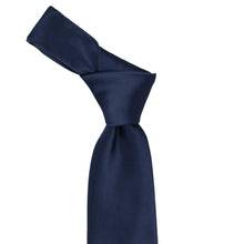 Load image into Gallery viewer, Knot on a navy blue tie