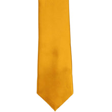 Load image into Gallery viewer, The front of a slim nugget gold solid tie, laid flat