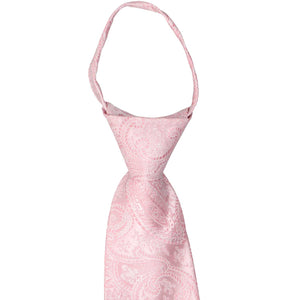 Front of a pale pink paisley zipper tie