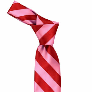 Knot on a pink and red striped tie