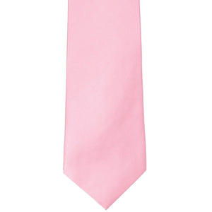 The front of a solid pink silk tie