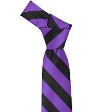 Load image into Gallery viewer, Knot on a purple and black striped tie