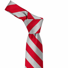 Load image into Gallery viewer, Knot on a red and silver striped tie
