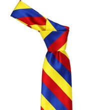 Load image into Gallery viewer, Knot on a red, royal blue and yellow striped tie