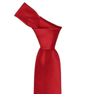 Knot on a red solid tie