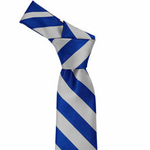 Load image into Gallery viewer, Knot on a royal blue and silver striped tie