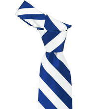 Load image into Gallery viewer, Knot on a royal blue and white striped tie