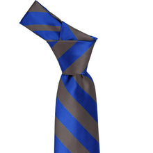 Load image into Gallery viewer, Knot on a royal blue and dark gray striped tie knot