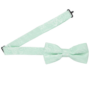 Open band on a seafoam paisley bow tie