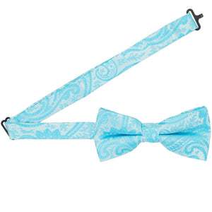 Open band collar on a turquoise paisley bow tie