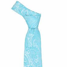 Load image into Gallery viewer, Knot on a tied turquoise paisley necktie