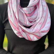 Load image into Gallery viewer, Woman wearing a pink and white breast cancer awareness infinity scarf