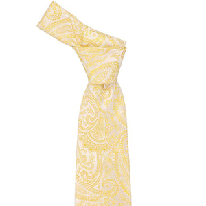 Knot on a tied yellow paisley necktie