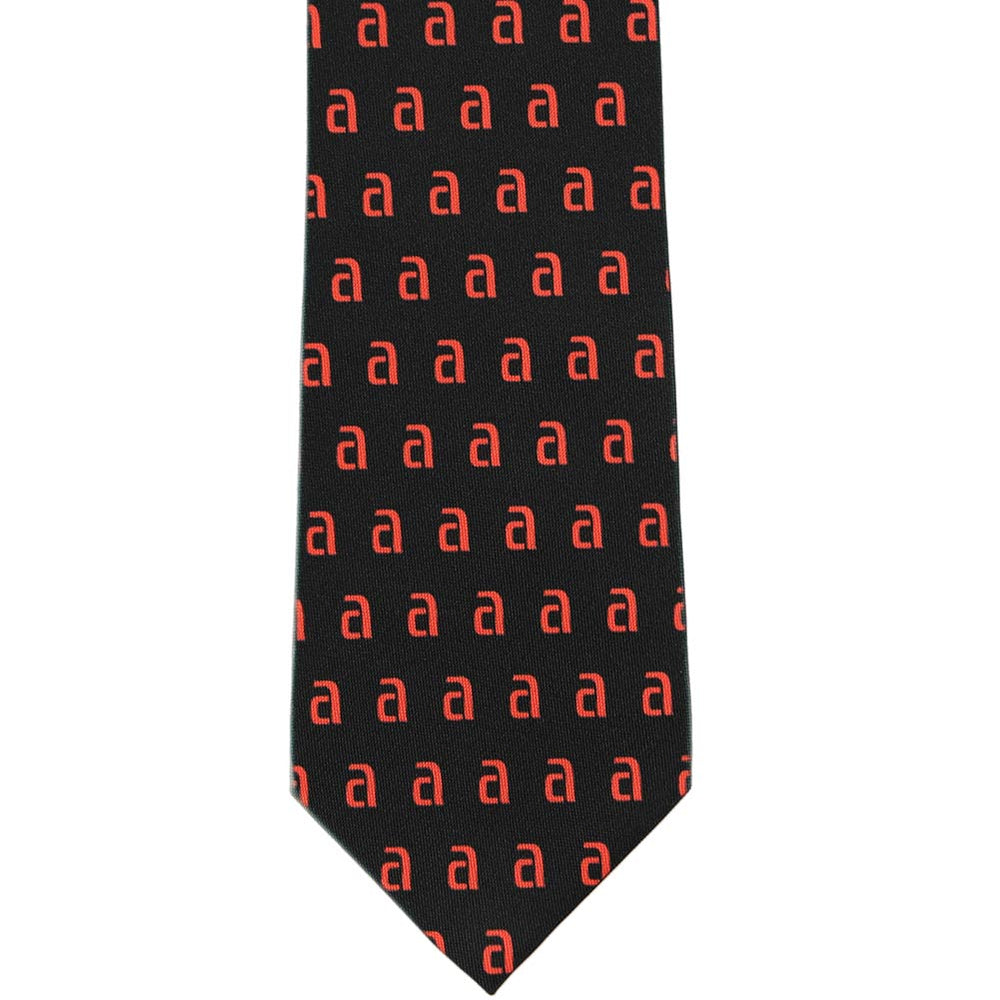 A black tie with the letter a in a red repeated pattern