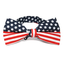 Load image into Gallery viewer, An American flag bow tie in red, blue and white stars and stripes