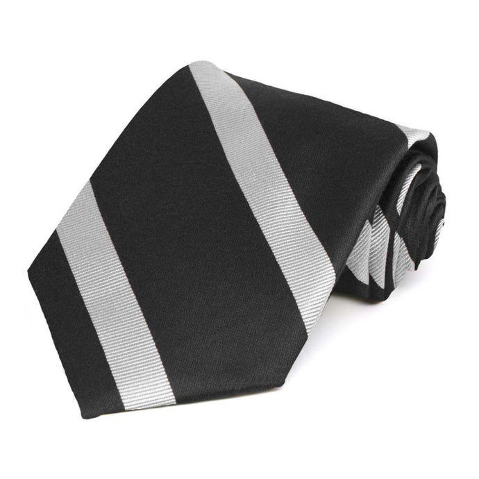 Rolled view of an extra long black and silver striped tie