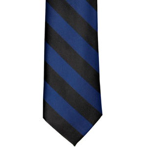 The front of a blue velvet and black striped tie