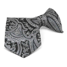 Load image into Gallery viewer, Boys&#39; black and silver paisley clip-on tie, folded front view