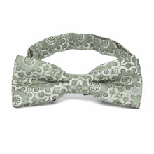 Load image into Gallery viewer, Front view of a boys&#39; floral pattern bow tie in mint green